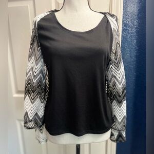 Elegant Black Top with Chevron Sleeves